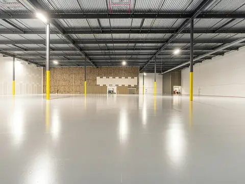 Spacious modern warehouse with a polished concrete floor
